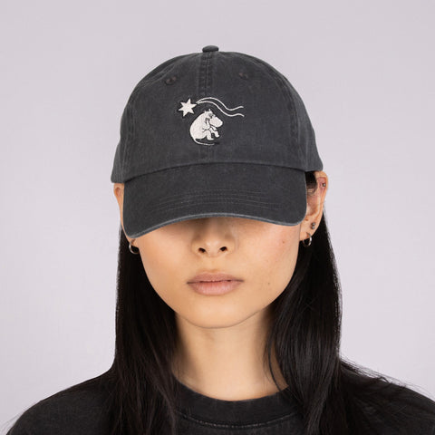 1. Woman wearing Moomin by NordicBuddies grey washed denim cap with embroidered Moomin design, front view