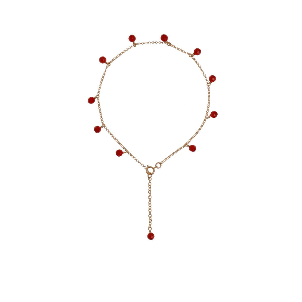 9. Studio image of New Vintage by Kriss Anklet Eat, Pray, Love in gold with coral accents