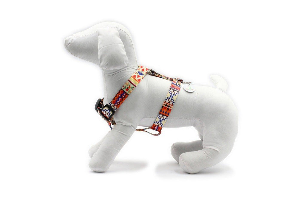 1. Side view of white mannequin dog wearing Matteo nylon dog harness in boho pattern, highlighting adjustable fit