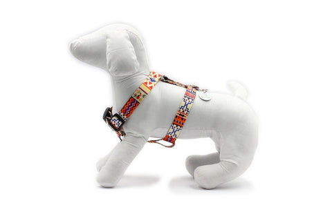 1. Side view of white mannequin dog wearing Matteo nylon dog harness in boho pattern, highlighting adjustable fit