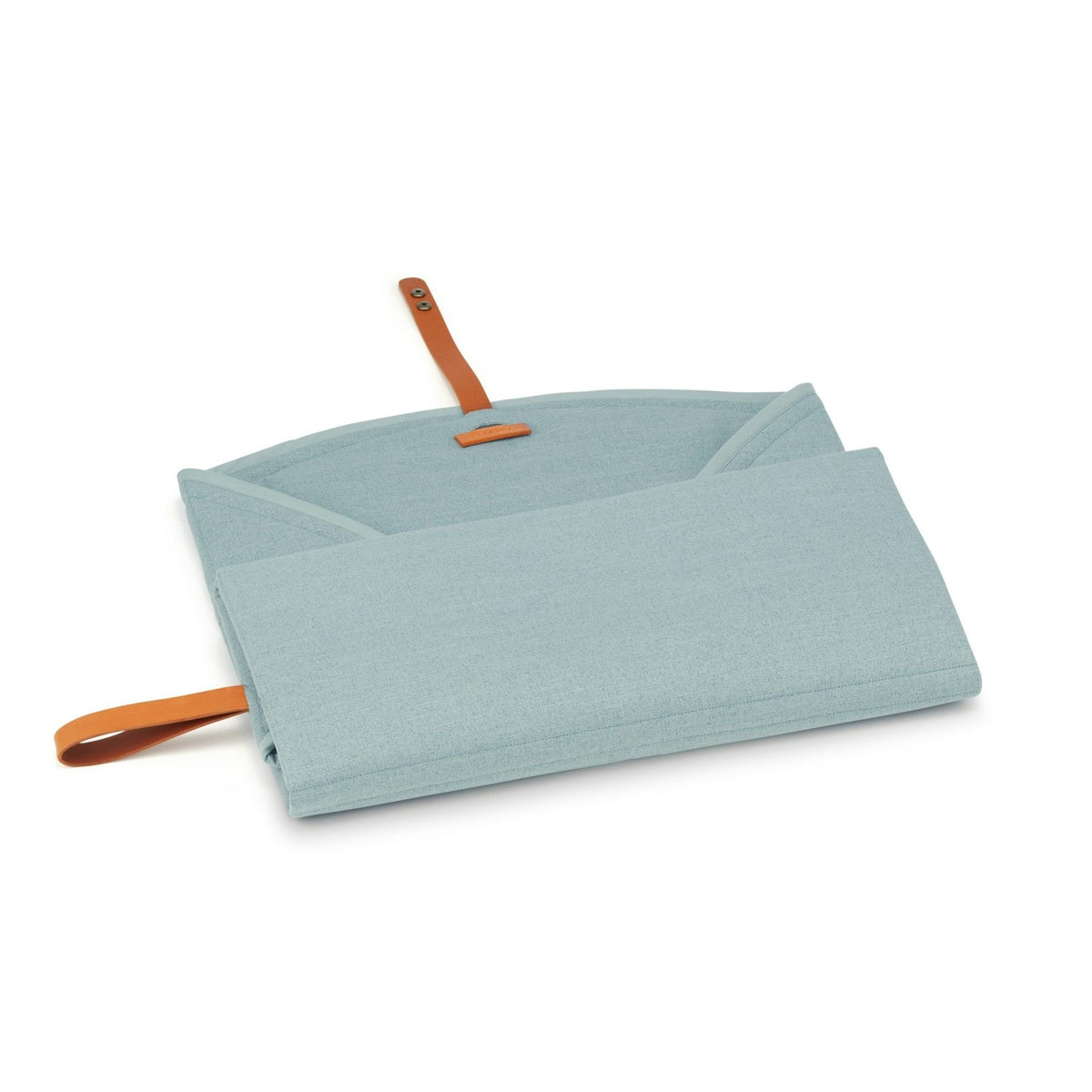 3. Partially folded Okka travel mat in soft teal with brown leather strap on white background