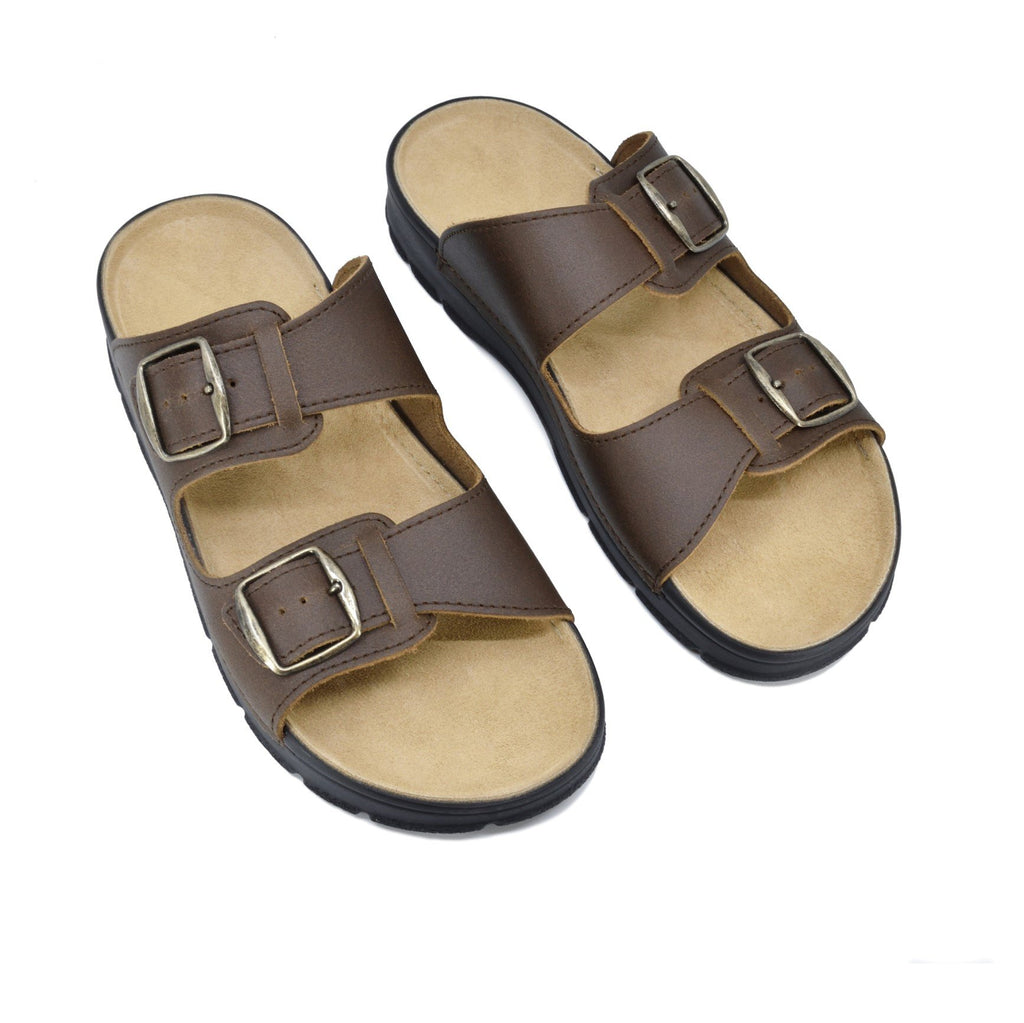 1. Brown Märt Sandals by Omaking with adjustable buckle straps, shown in a studio setting