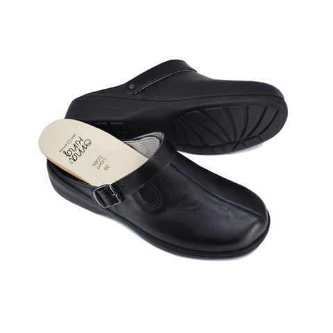 2. Pair of Omaking Loosu black leather sandals with removable cork insole, displayed in studio with view of sole and top