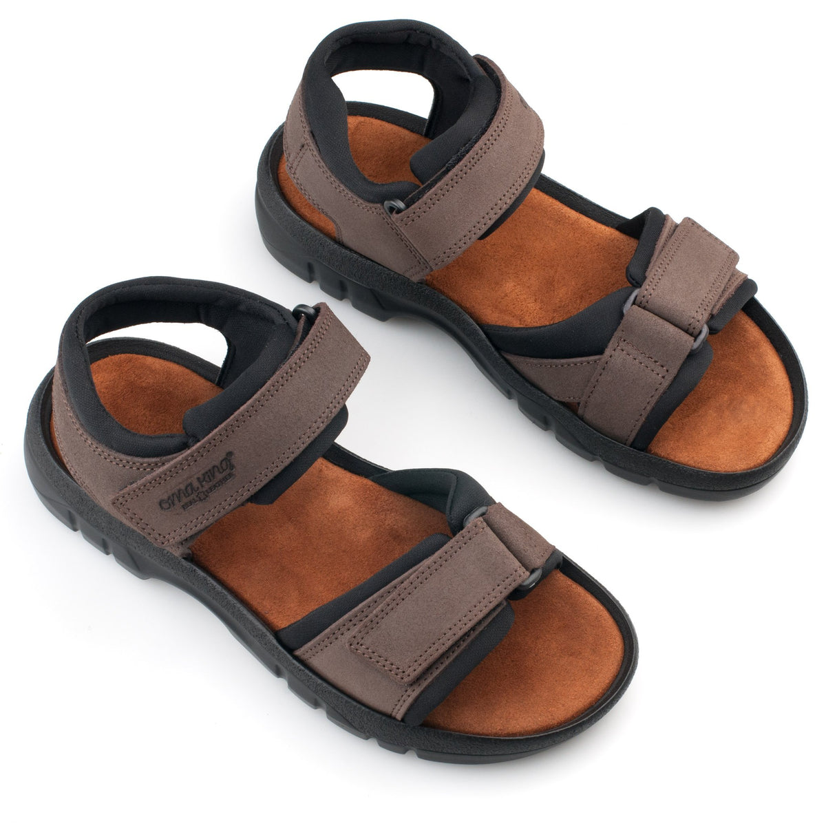 1. Omaking Tiidu brown leather sandals with adjustable velcro straps, shown in studio setting
