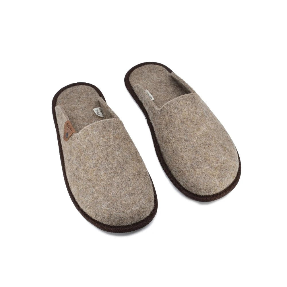 2. Pair of Omaking Pelsi slippers in brown felt, top view highlighting design and leather accents