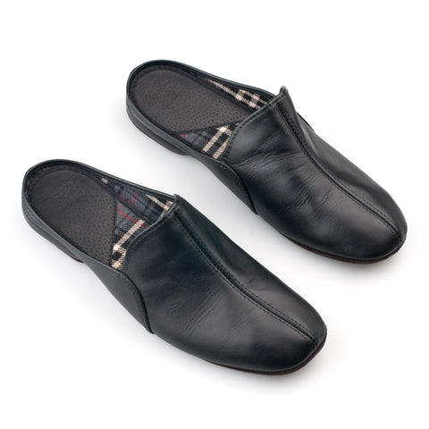 2. Top view of Omaking Sika leather slippers in black, highlighting cotton lining and durable craftsmanship