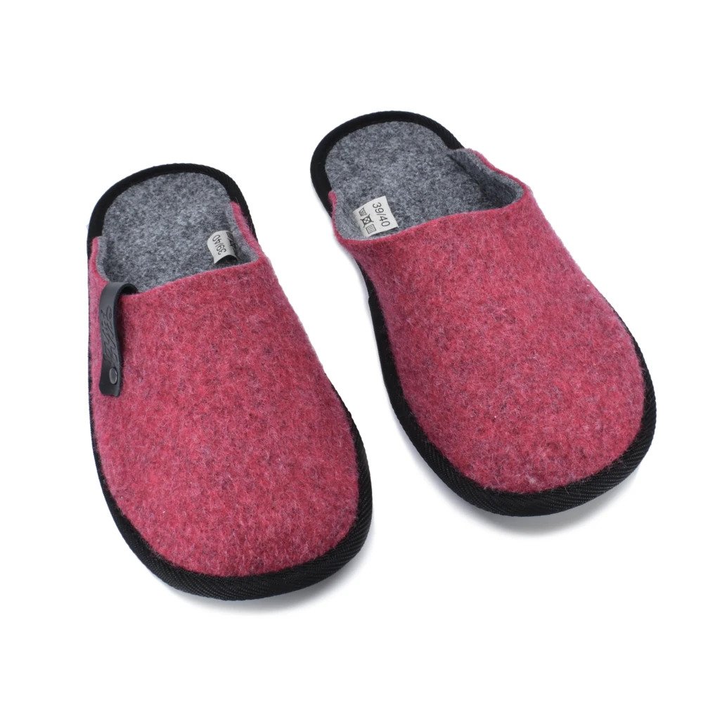 2. Pair of women's red Navi slippers by OmaKing, made from recycled plastic bottles, displayed in a studio setting