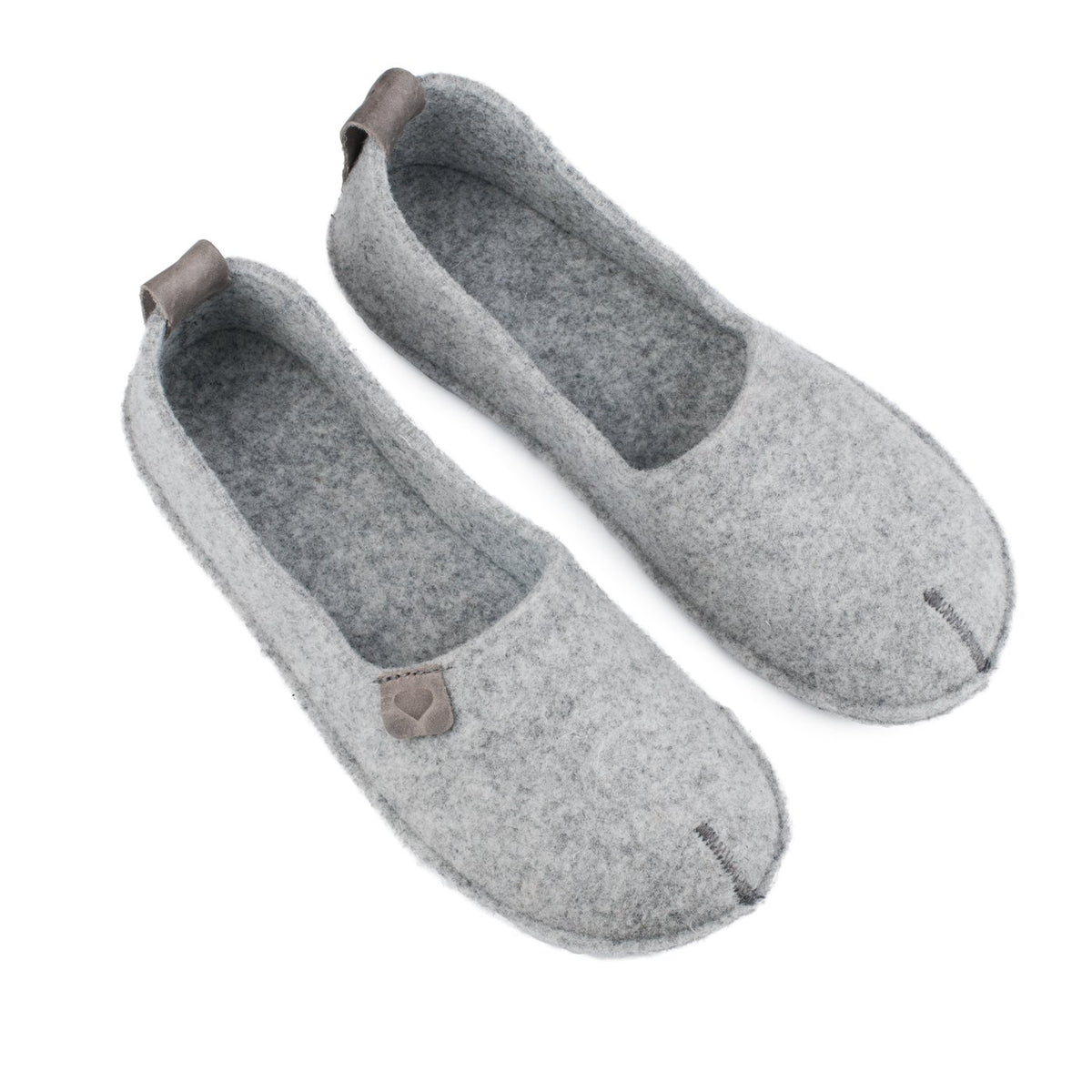 1. Women's grey Toku slippers by OmaKing, featuring natural felt upper and rubber sole, shown in studio setting