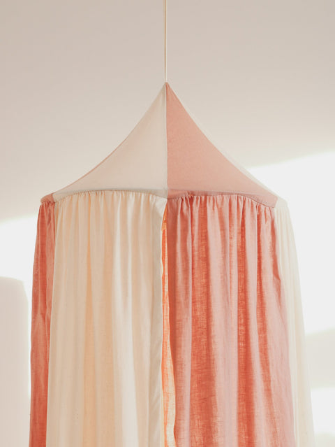 4. Close-up of powder pink and cream canopy top, highlighting the fabric texture and color contrast.