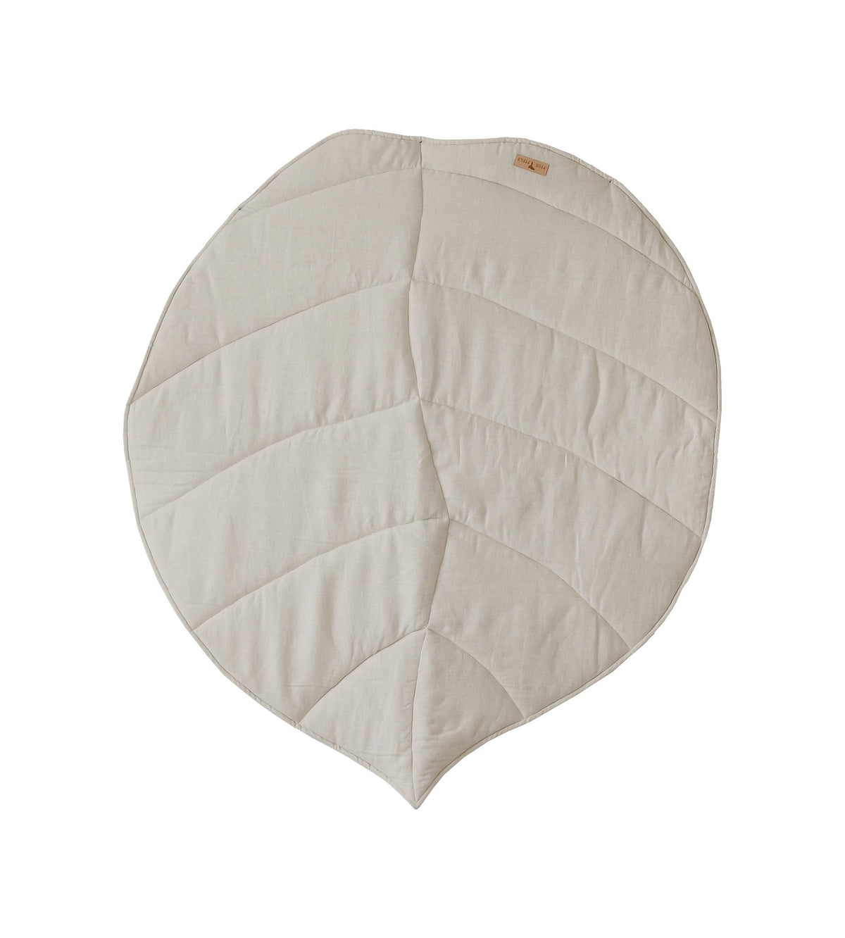 7. Flat lay of sand leaf playmat highlighting leaf shape and stitching