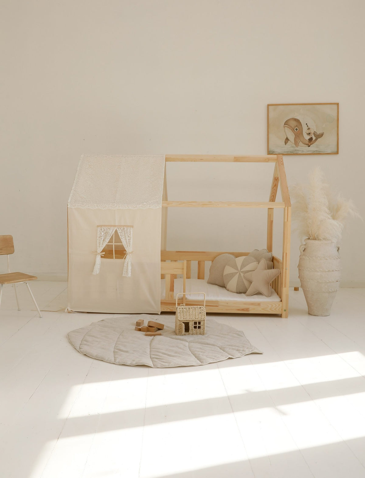 9. Sand leaf playmat in bright nursery with wooden bed and natural light