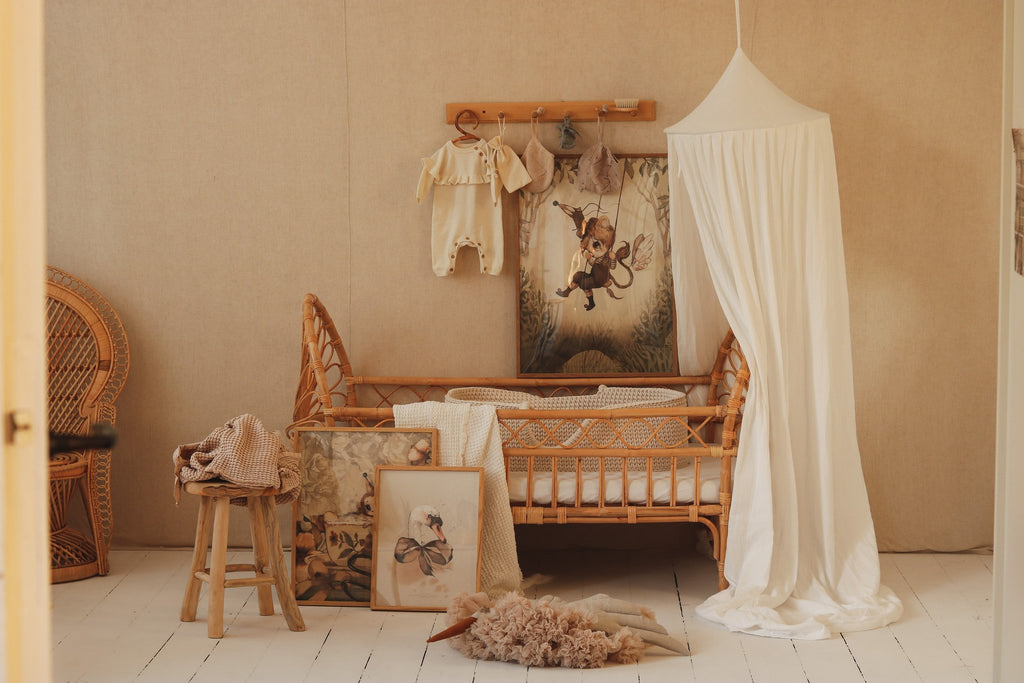1. Cream cotton canopy in a nursery with wicker crib and playful wall art, creating a whimsical space
