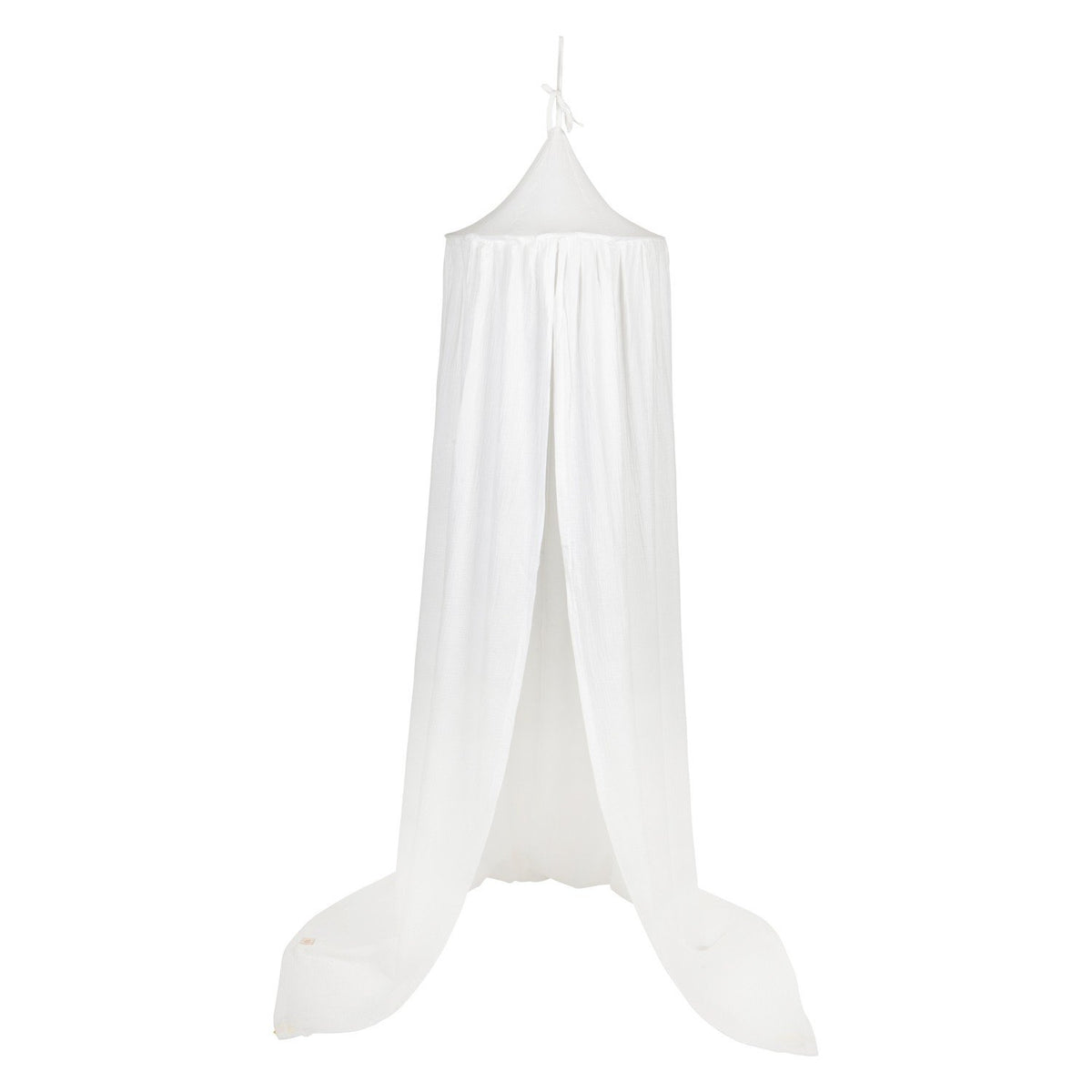 2. Studio shot of cream cotton canopy with flowing drapes, highlighting its elegant design