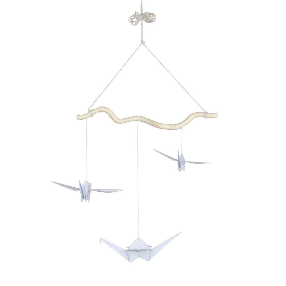 4. Studio shot of white origami nursery mobile with three paper cranes and wooden stick on white background