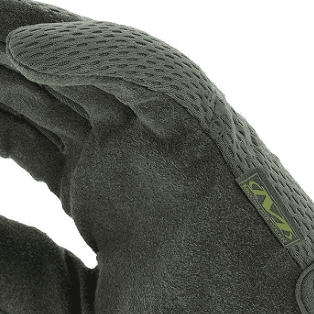 3. Detail of military green Mechanix glove showing breathable TrekDry material and logo tag