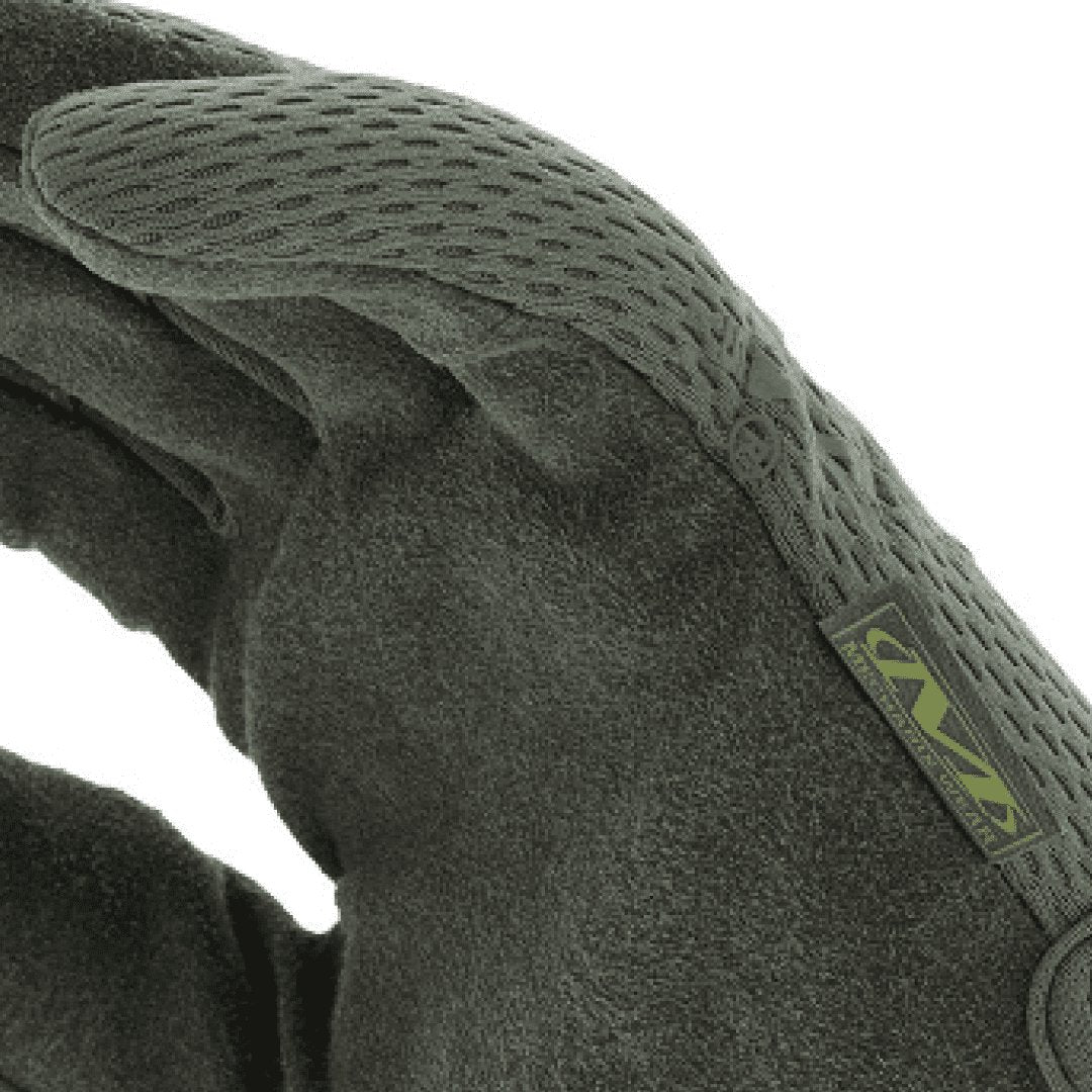 3. Detail of military green Mechanix glove showing breathable TrekDry material and logo tag