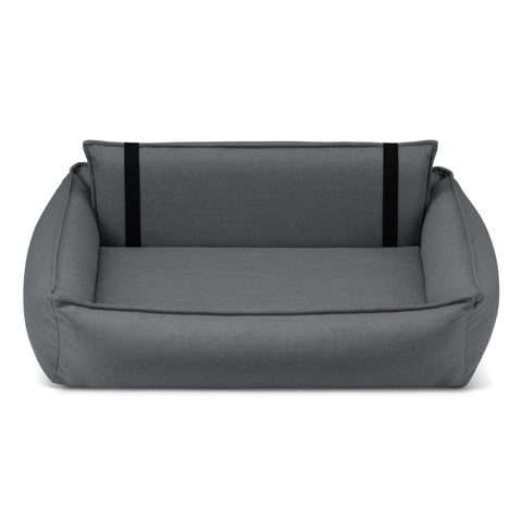 2. Dark grey Orteo dog bed with orthopedic features, showing removable backrest and elastic elements, designed for comfort and support, by Labbvenn, on a white background.