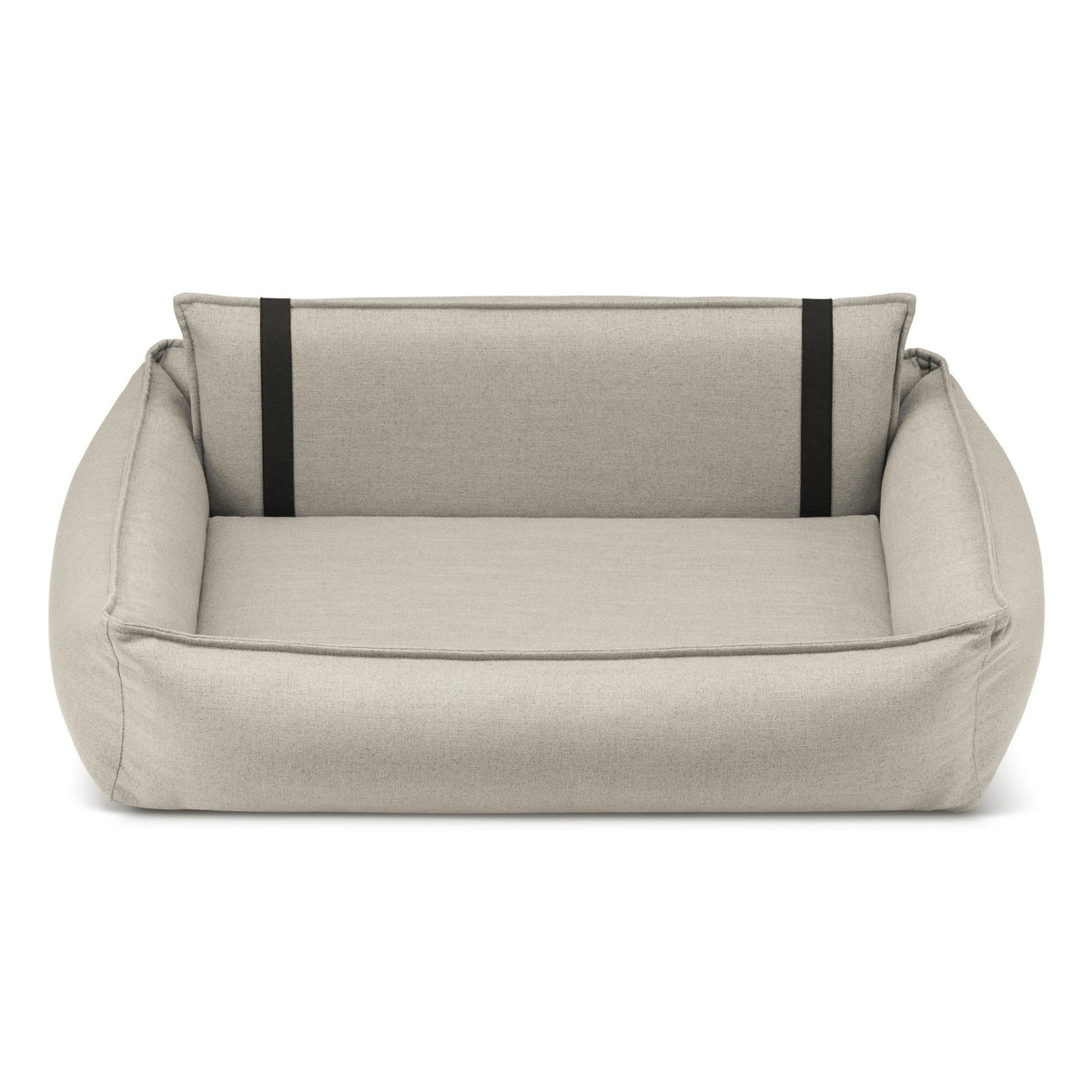 2. Beige Orteo dog bed by Labbvenn with orthopedic features, shown in studio setting highlighting removable rear backrest and elastic elements for enhanced comfort and support