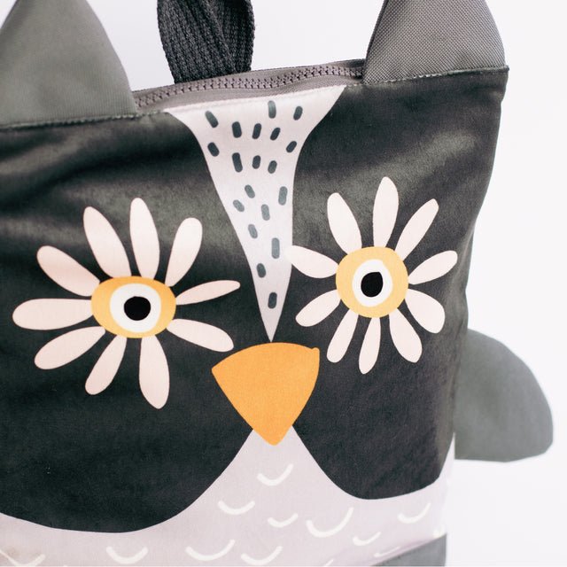6. Close-up of Muni owl backpack highlighting owl face design