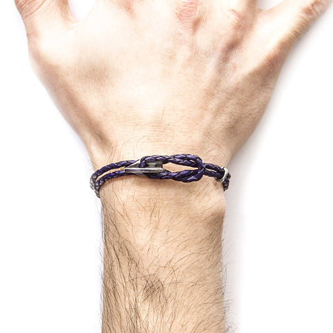 2. Men's Padstow silver and braided leather bracelet in grape purple worn on wrist, showcasing secure clasp