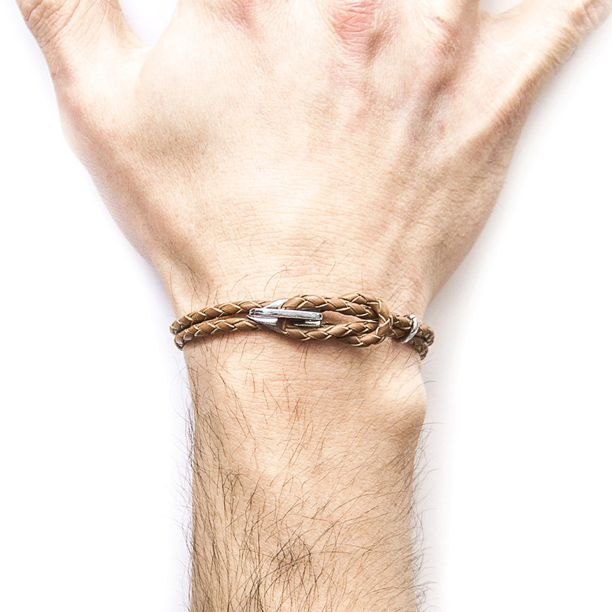 2. Men's Padstow silver and braided leather bracelet in light brown shown on wrist, highlighting sterling silver clasp