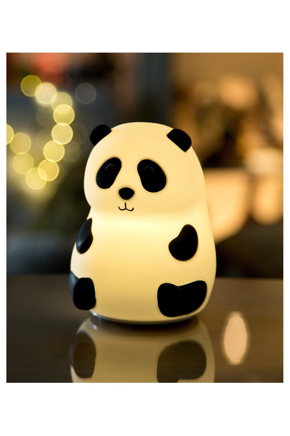 1. Rabbit & Friends panda silicone lamp glowing warmly in a cozy room setting