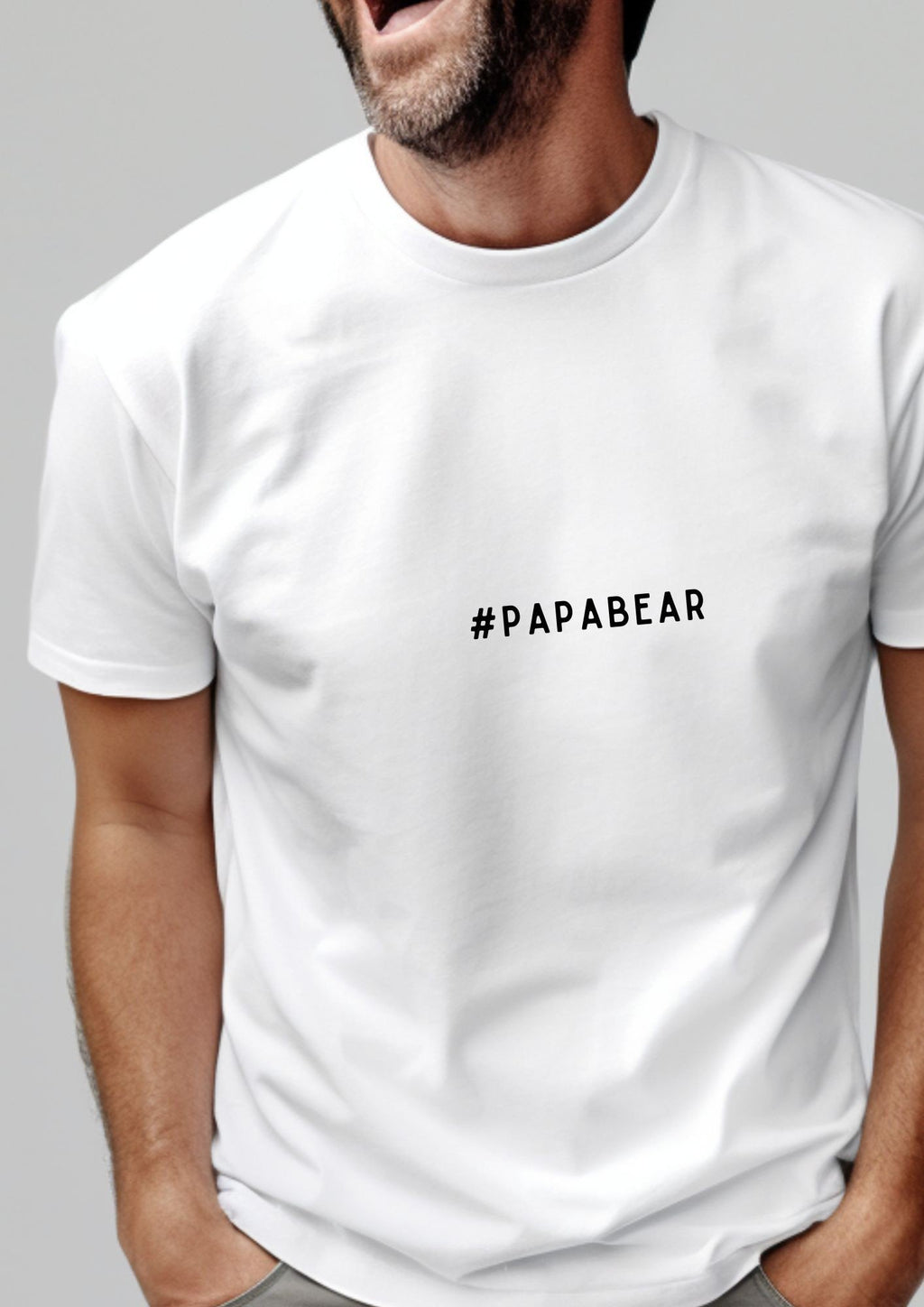 1. Man wearing white #PAPABEAR T-shirt by Black Giraffe Brand, made from 100% organic cotton, shown in a casual pose with a light grey background