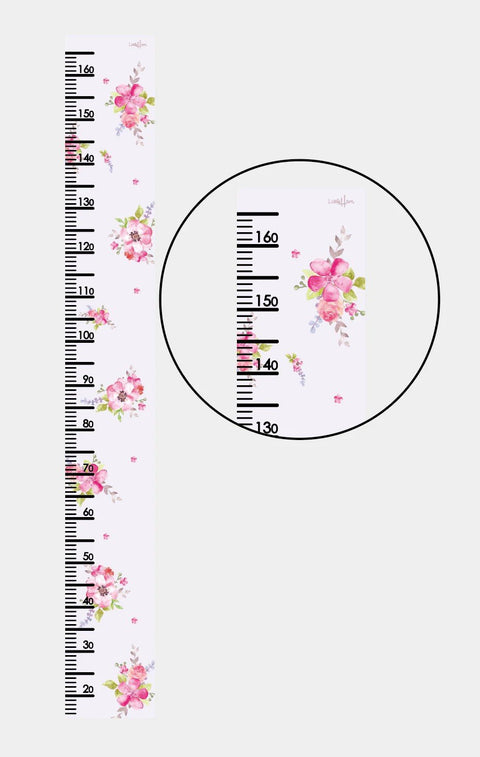 2. Studio shot of floral paper growth chart with close-up inset showing measurement details