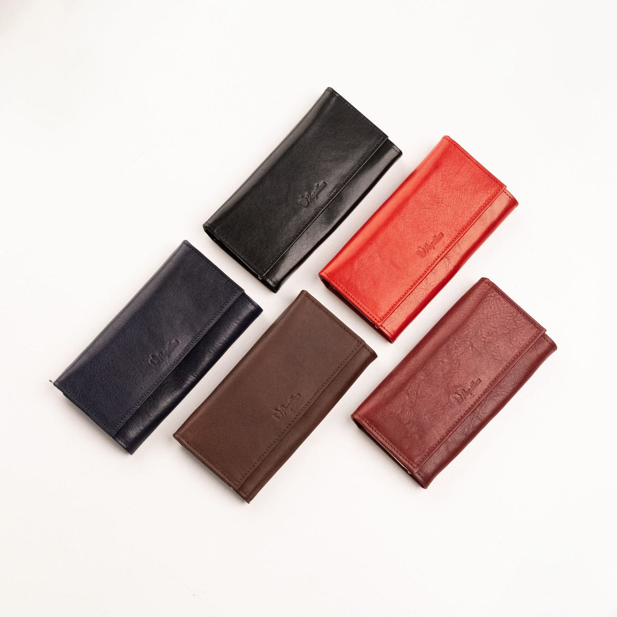 8. Collection of Papillon women's leather wallets in various colors, shown in flat lay