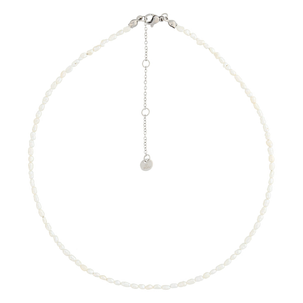 2. Olla necklace with freshwater pearls in polished silver, featuring adjustable extension chain, studio shot