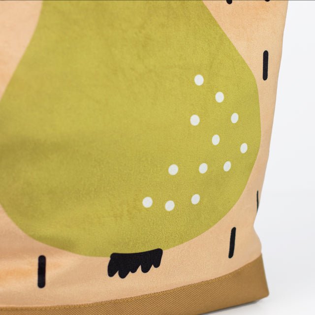 7. Close-up of Muni PEAR backpack's pear motif on velvet fabric