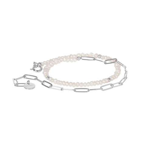 1. MyaMoon Pearlstring Bracelet-Choker in silver rhodium, featuring elegant pearls and adjustable chain, studio shot