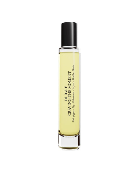 1. maar Craving the Moment perfume oil in 10ml roll-on bottle with black cap on white background