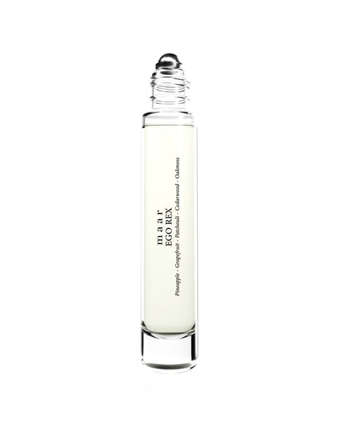 2. Studio shot of maar Ego Rex perfume oil in 10ml clear glass bottle with roll-on applicator, highlighting unisex alcohol-free formula