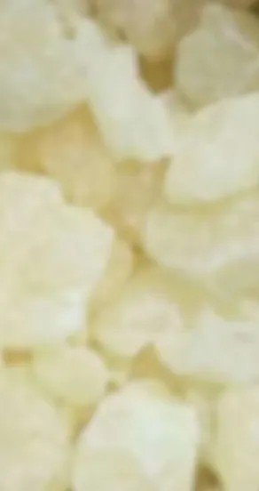 3. Close-up of amber resin crystals, showcasing natural fragrance components