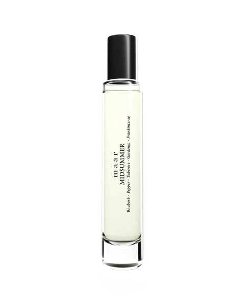 1. maar Midsummer perfume oil in clear glass bottle with black cap, 10ml size, studio shot