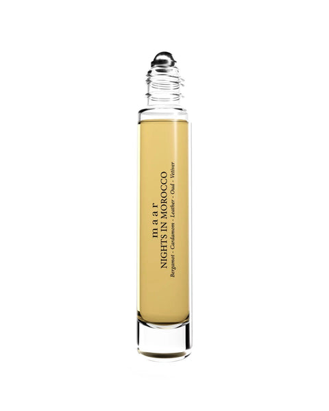 2. maar Nights In Morocco perfume oil with open roll-on applicator, highlighting sleek design and golden hue