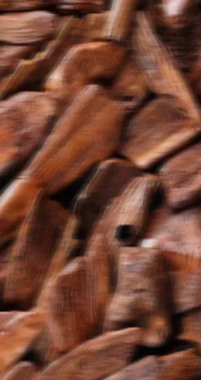 9. Close-up of brown wood chips, highlighting earthy fragrance notes