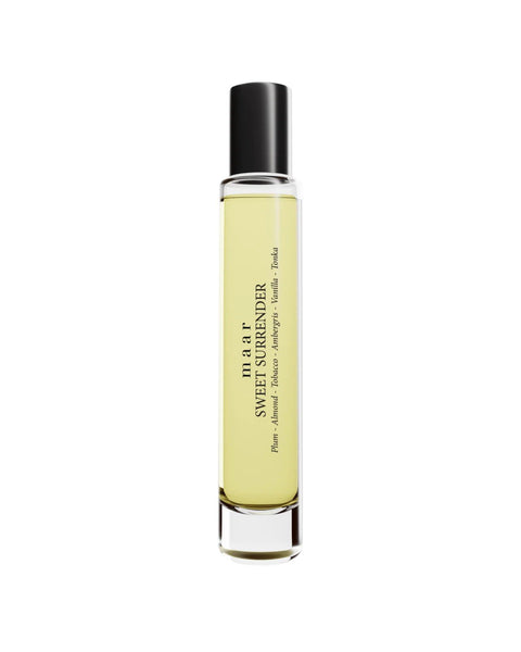 1. maar Sweet Surrender perfume oil in clear glass bottle with black cap, featuring plum, almond, and vanilla notes