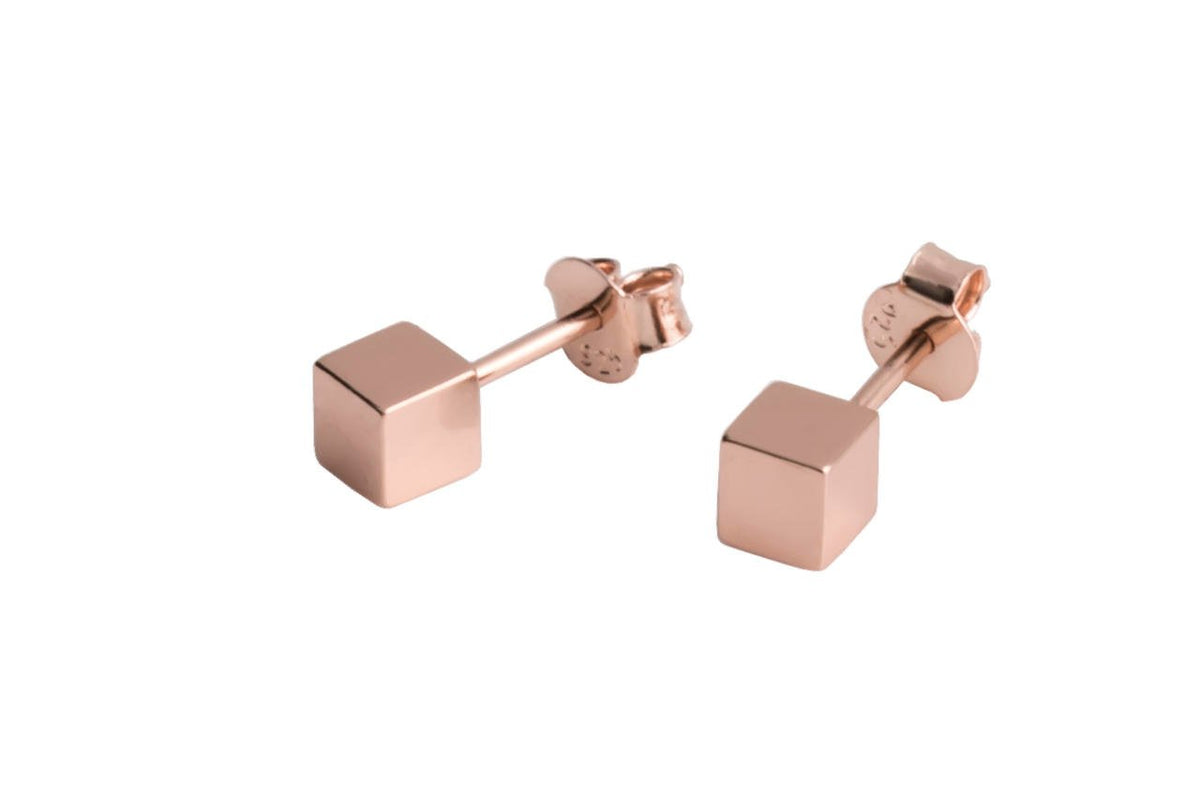 2. MyaMoon rose gold cube earrings in minimalist design, made from 925 silver, shown in studio setting