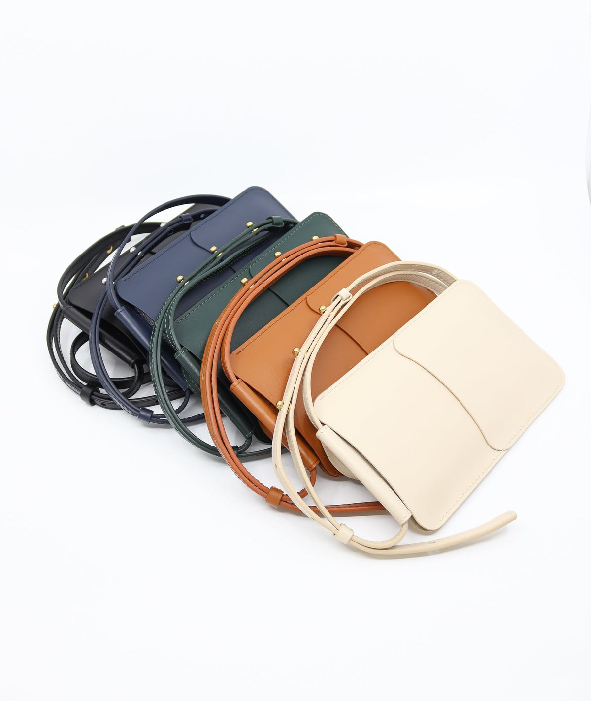 6. Collection of Tairi Roosve leather phone bags in various colors including beige, navy, and brown