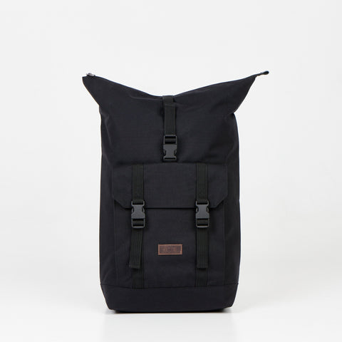 5. Front view of Noel Cliff 25L black backpack with extended top, featuring buckle closure