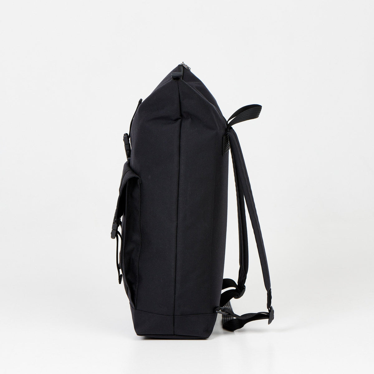 6. Side profile of Noel Cliff 25L black backpack showing depth and strap design