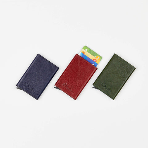 4. Papillon Card Holder No. 40 in blue, red, and green leather with cards visible, emphasizing color variety