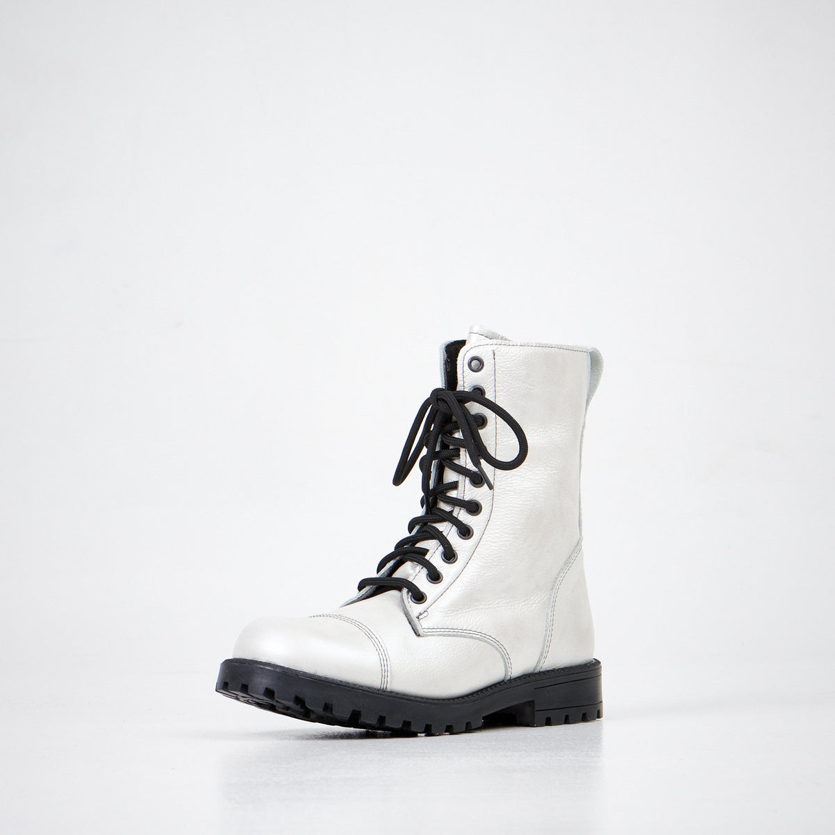 3. Women's 511 Bianco boots in white leather, front angled view highlighting lace-up design and durable sole