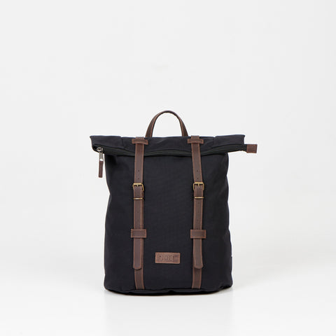 2. Noel black zip backpack with leather straps, front view slightly angled in studio