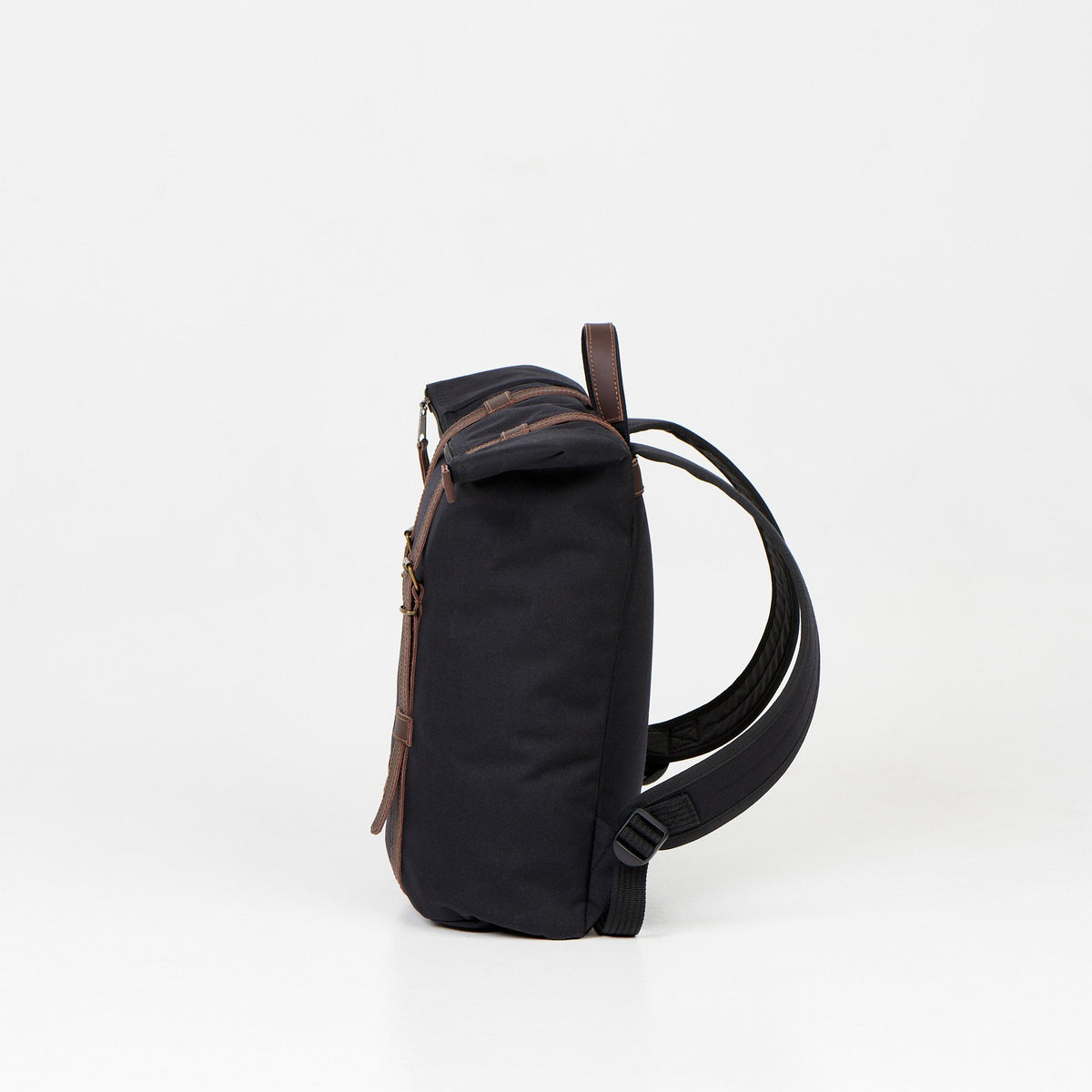 3. Side view of Noel black zip backpack showing adjustable shoulder straps