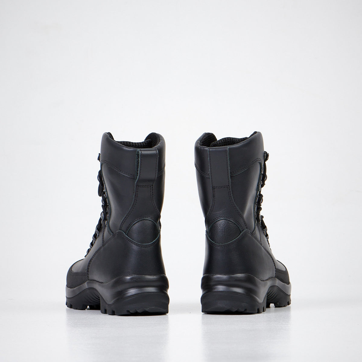 1. Back view of Samelin Waterproof Combat Boots 734 in black, showcasing reinforced heel and dual-layer outsole