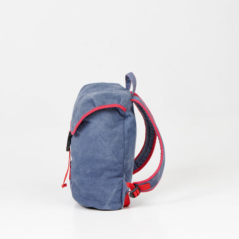 3. Side view of Noel Walker 12L backpack highlighting water-repellent canvas material