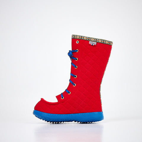 1. Red quilted boot with blue sole and laces, side view, featuring decorative trim at the top